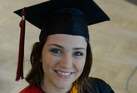 Female graduate smiling